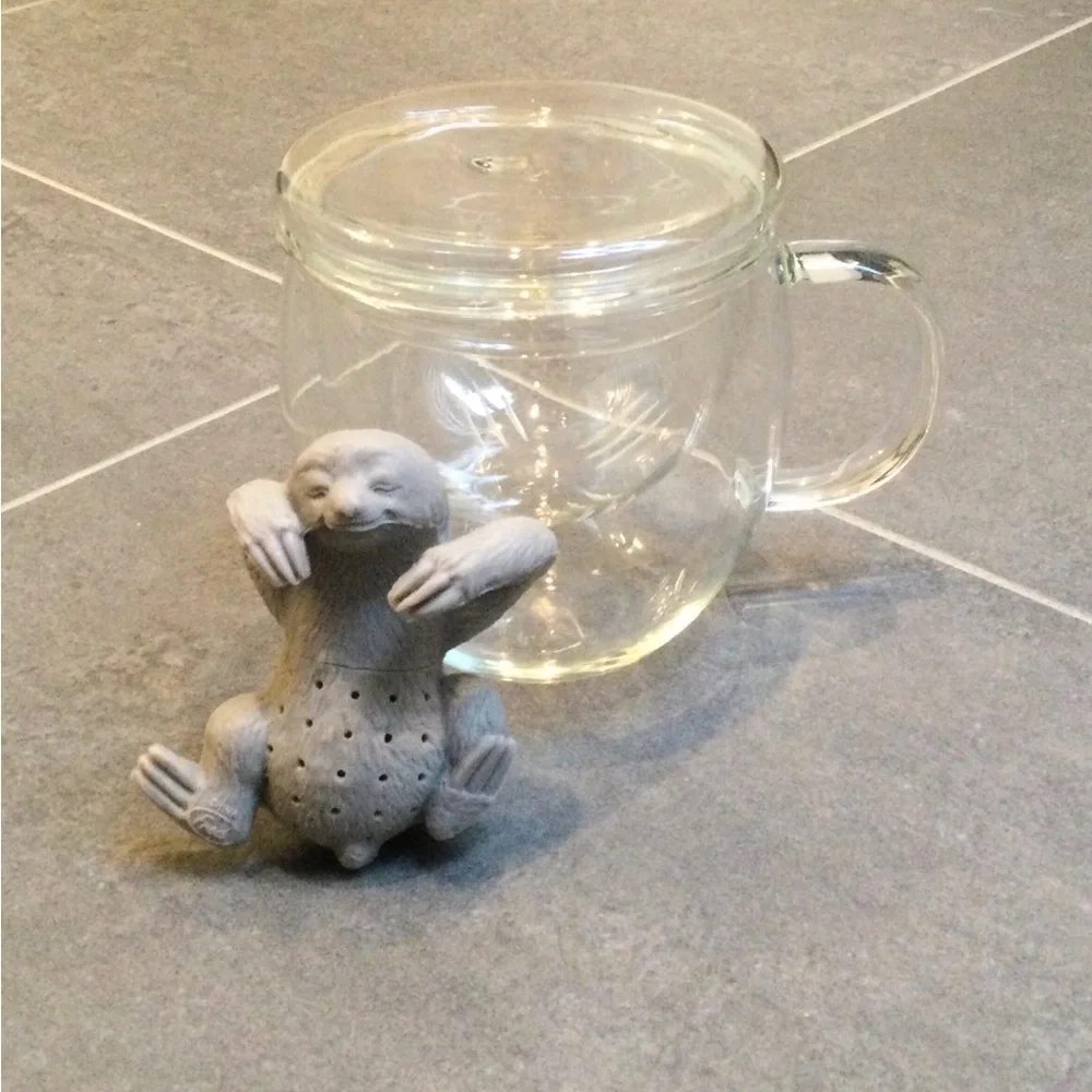 Glass tea mug and sloth slow brew infuser
